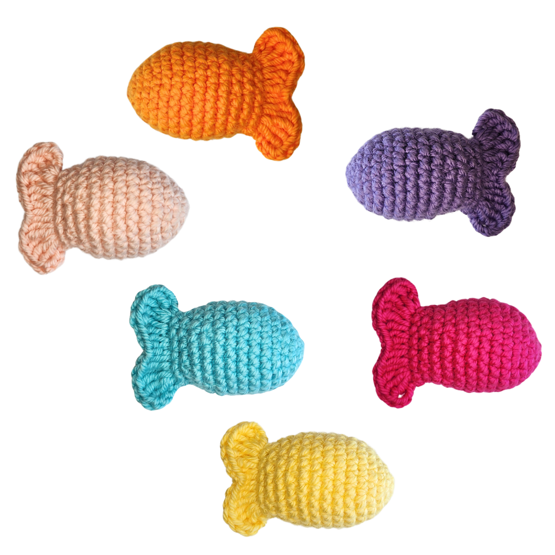 crocheted fishy catnip toys, orange, pink, purple, teal, magenta and yellow