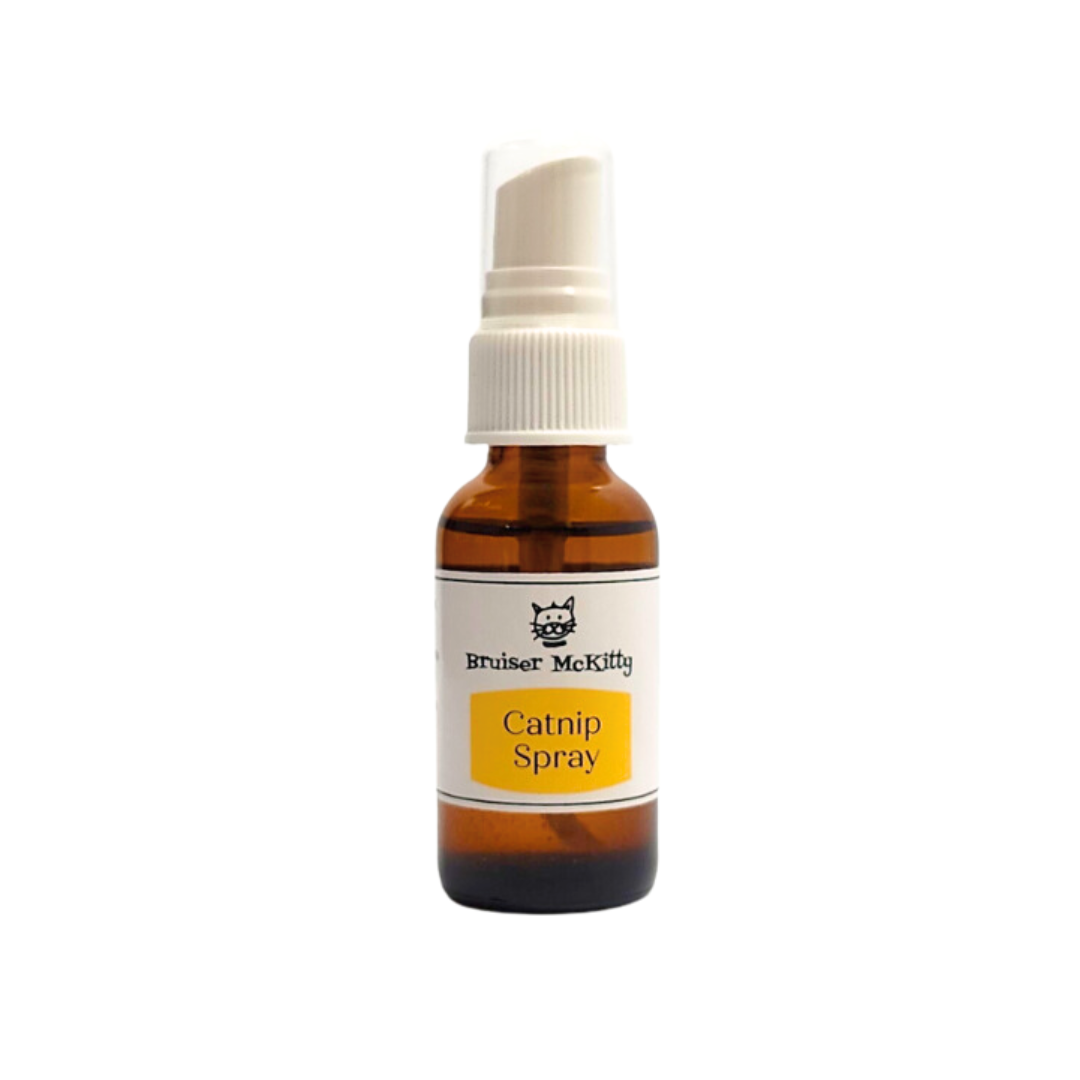 brown bottle of catnip spray with white cap and white and yellow lable