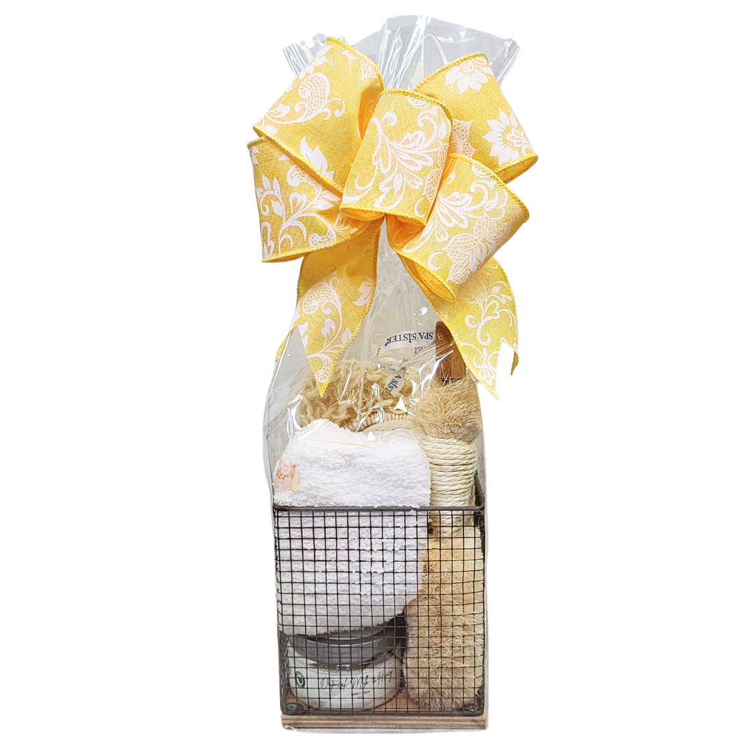 dry brush gift wrapped in cello with a yellow bow