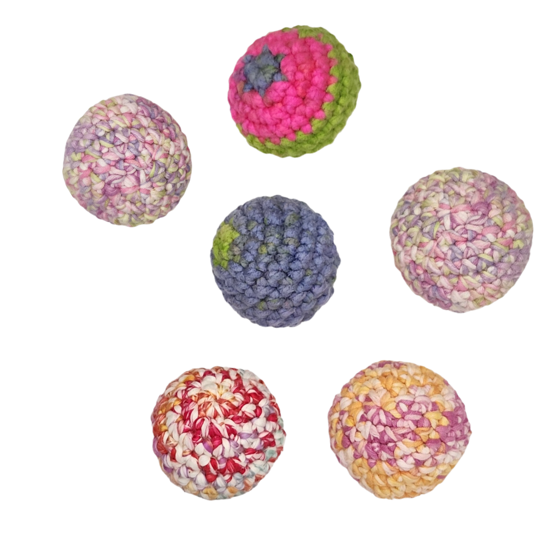 different colored crocheted catnip balls