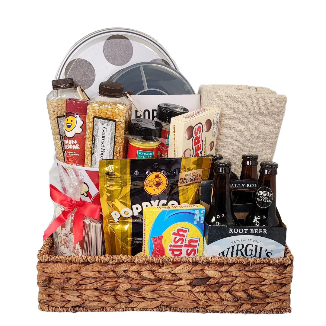 popcorn, snacks, candy, root beer, blanket in a wicker tray