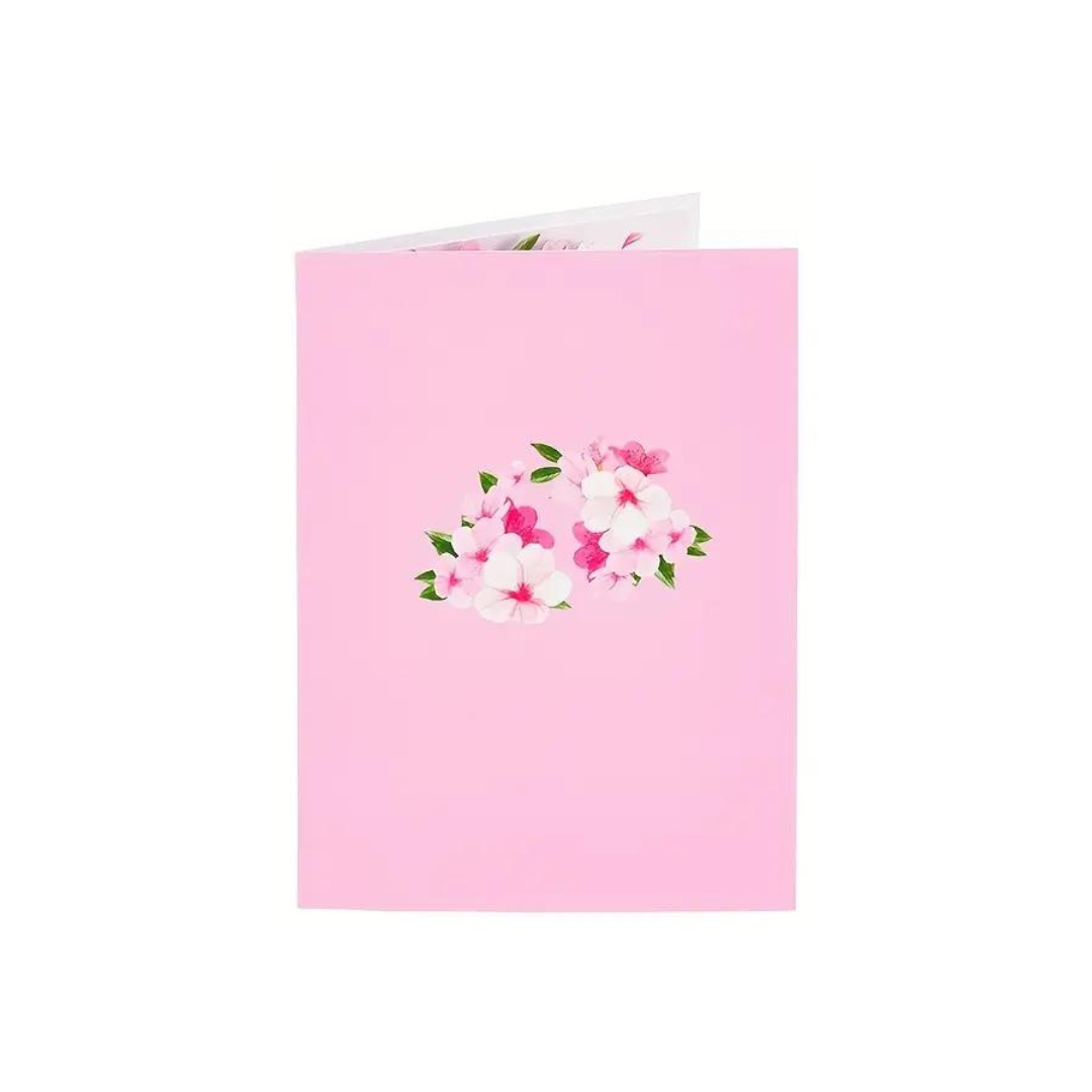 front view of pop out greeting card with pink and white cherry blossoms