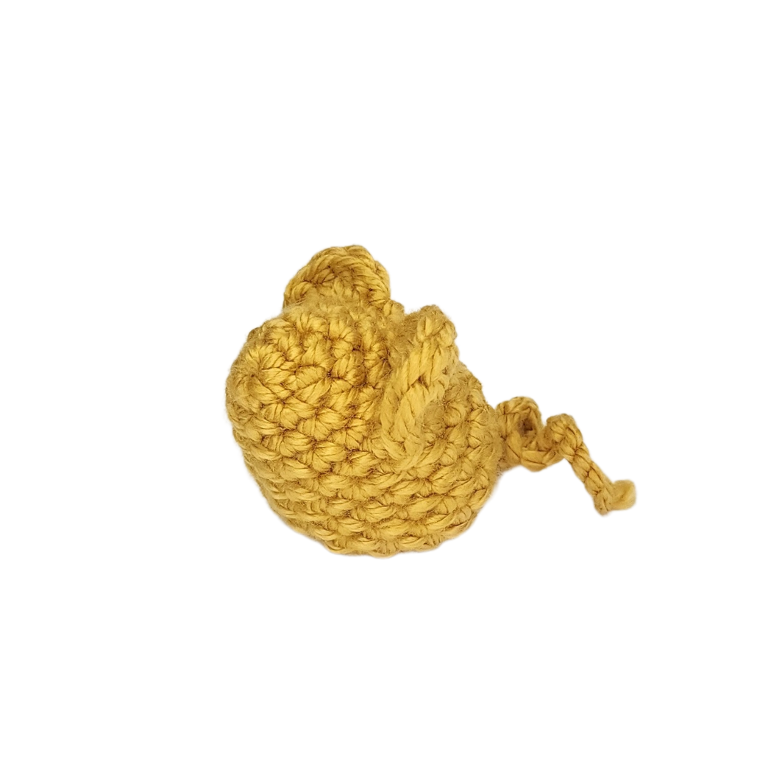 crocheted mouse in gold