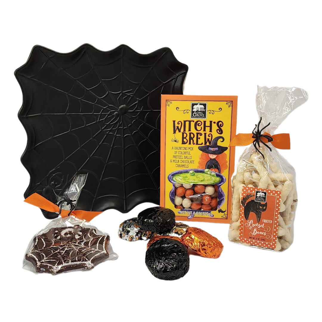 black spider web platter with long grove confectionery chocolates in a halloween theme