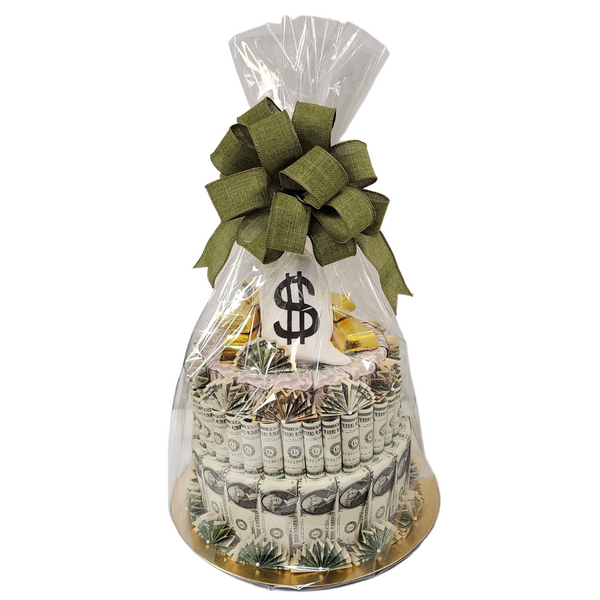 CASH CAKE - $250 VERSION: Two-tiered cake made of genuine US currency, wrapped in cellophane with a green bow, featuring candy-filled gold bar favor boxes.