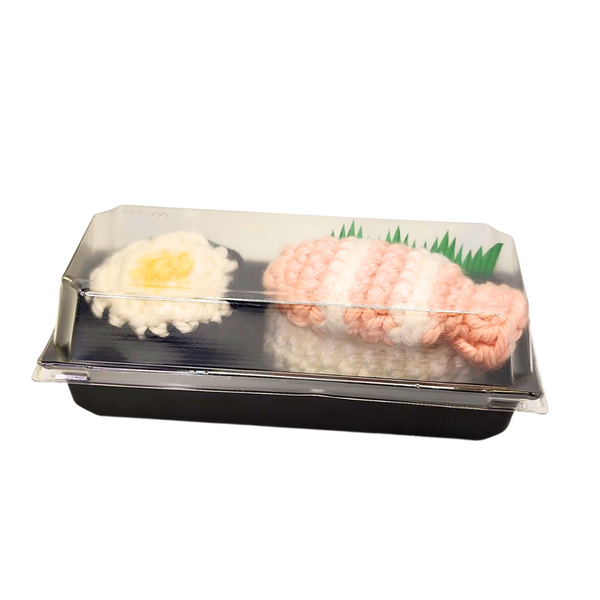 SUSHI CATNIP TOYS, SET OF 2 in a plastic container showcasing crocheted sushi designs, filled with organic catnip, perfect for playful cats.