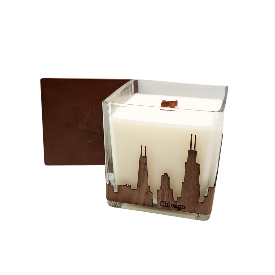 square glass candle with wood wick and wood wrap of chicago skyline, includes wood top