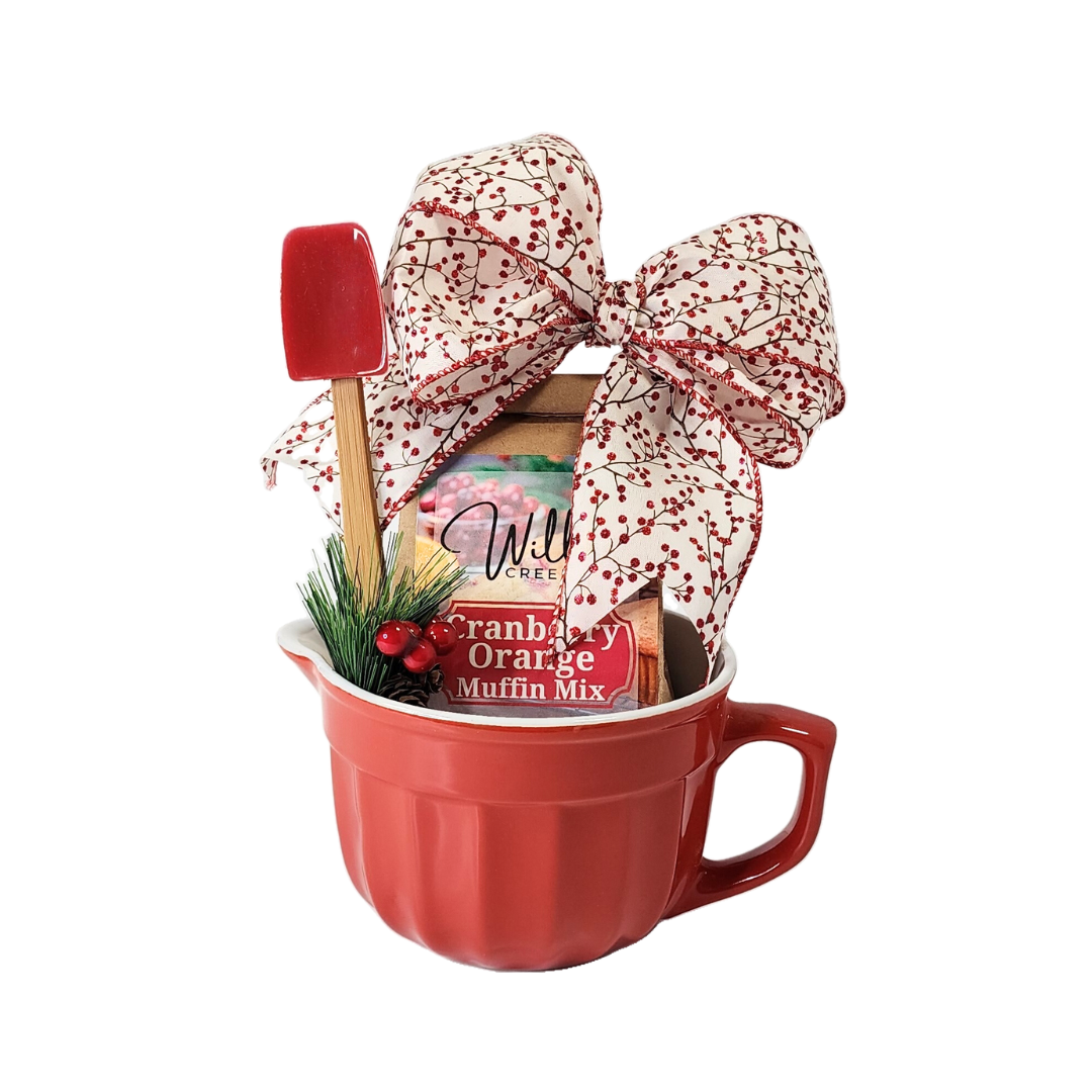 Christmas Morning Muffin Mix Gift: Red mixing bowl with cranberry orange muffin mix, bow, mini spatula, and gift card. Perfect for a festive morning treat.