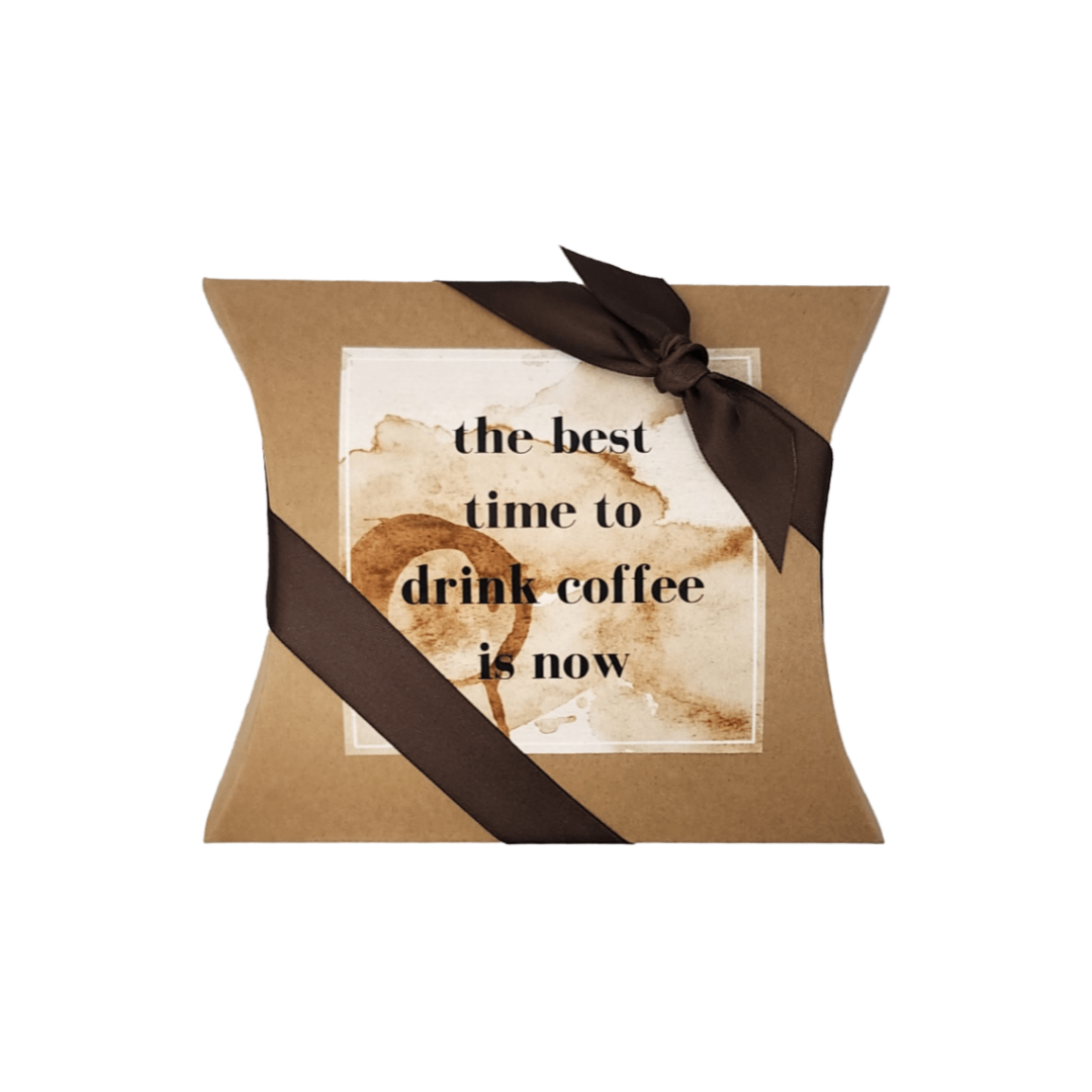 brown draft pillow box with brown ribbon and a coffee label