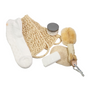 DRY BRUSH SPA GIFT SET featuring exfoliation tools, a jar of cream, and treatment socks, ideal for pampering and self-care.