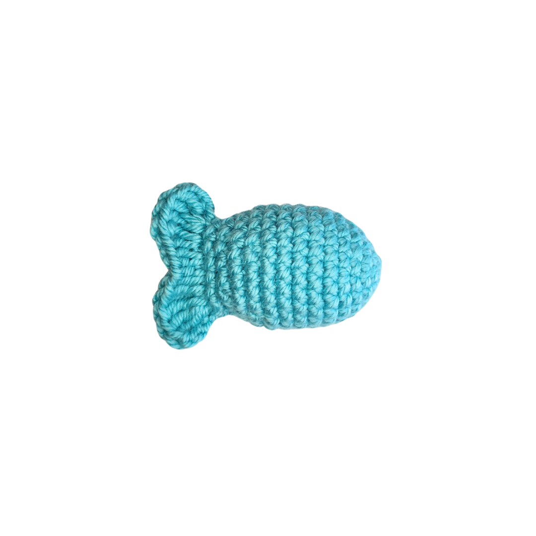 Fishy Catnip Toy, a blue knitted fish, filled with organic catnip and silver vine, perfect for playful cats of all sizes.