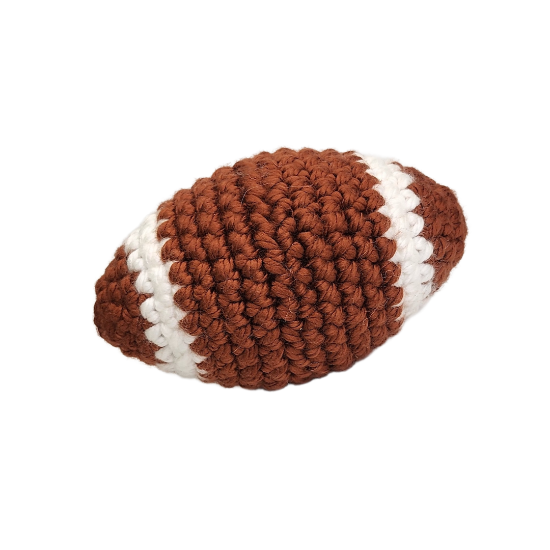 Knitted Football Catnip Toy, handmade for cats, featuring Bruiser's organic catnip and silver vine. Ideal size for playful feline kicking.