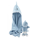 LET THE FIN BEGIN BABY BATH SET featuring a shark-themed hooded towel, bath mitt, and spa slippers, perfect for making bath time fun and engaging.