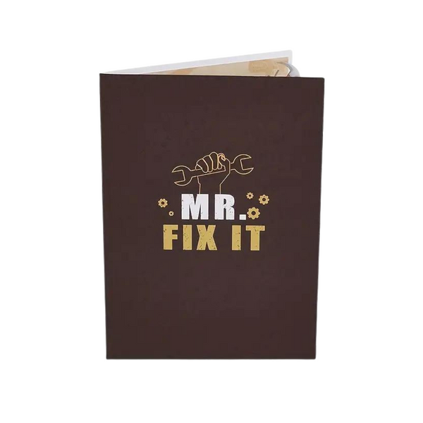 MR FIX IT Father's Day pop-up card featuring a wrench design, highlighting Dad as Mr. Fix It. Includes a blank note card for personalization.