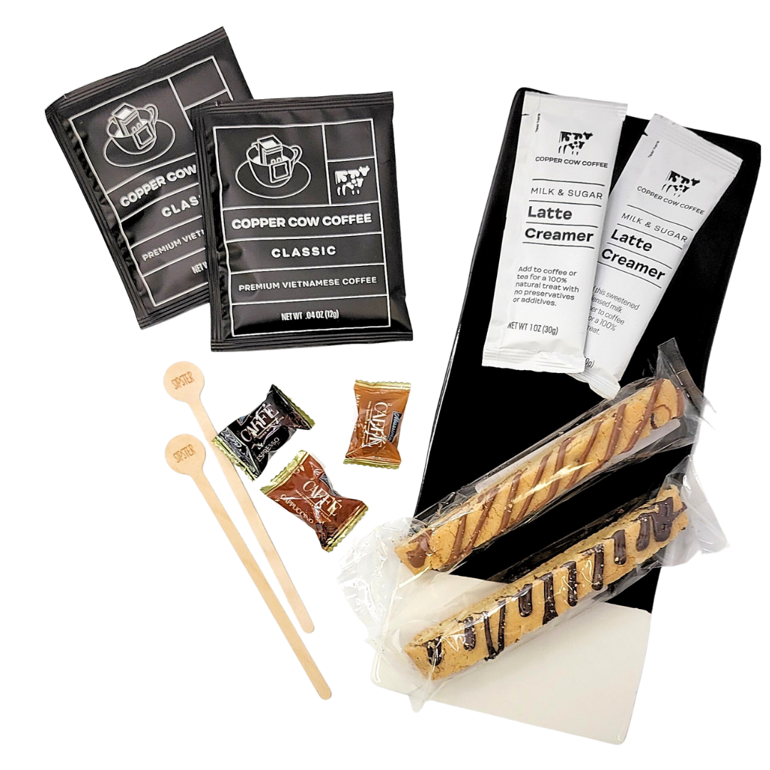 OWN THE DAY MINI COFFEE GIFT: Includes pour-over coffee, biscotti, creamers, wooden stir sticks, and coffee candies, all beautifully packaged in a decorative pillow box.