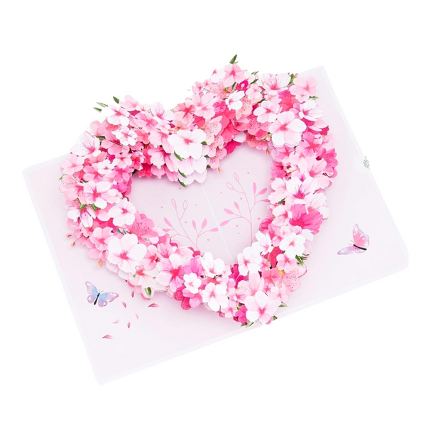 Pink Heart Pop Up Card featuring a heart-shaped flower wreath with cherry blossoms, perfect for personalized sentiments on special occasions.