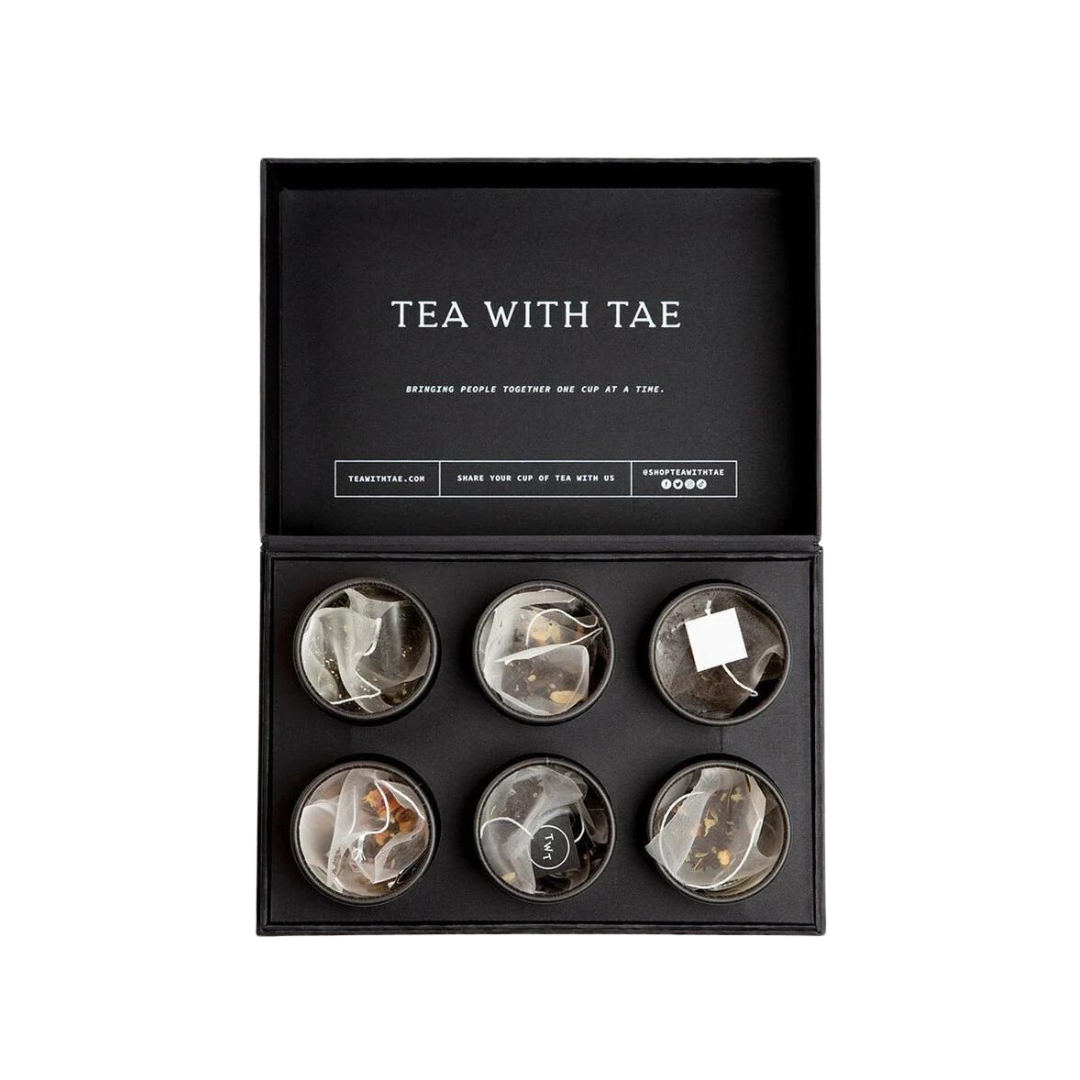 Tea Bento Gift Box with six round containers, each holding premium tea sachets, elegantly packaged as a unique, customizable tea gift from Celebratopia.